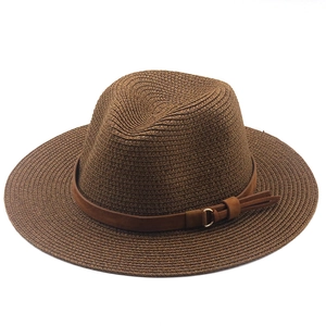 Detail of dark brown wide brim straw hat with leather band and metal buckle