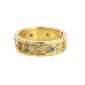 Vintage golden ring with multicolored zircon stones and intricate engraved bead textures