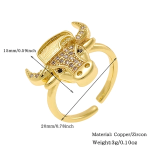 Detail view of gold bull head ring with copper zircon material and size specifications