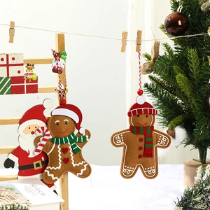 Felt gingerbread man and Santa Claus Christmas tree hanging decorations with red scarves