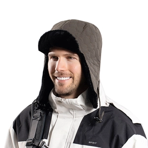 Brown quilted winter trapper hat with black faux fur lining and ear flaps for cold weather