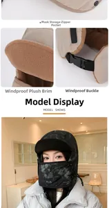 Close-up of windproof mask storage pocket and plush earflap details on winter bomber hat