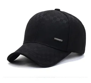 Close-up of black baseball cap with checkered texture and small metal logo decoration