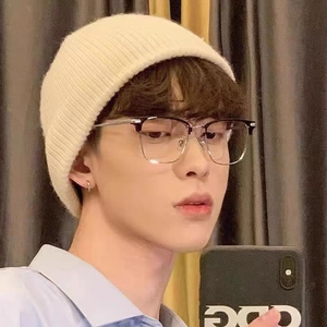 Men's stylish semi-rimless anti-blue light glasses paired with a beige knitted beanie hat