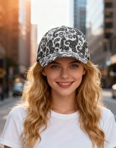 Detail shot of the paisley pattern and fabric texture on a monochrome baseball cap