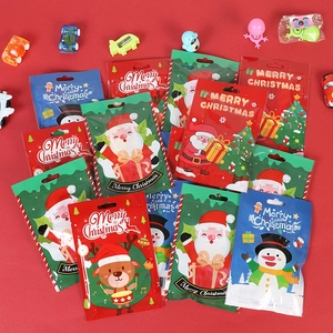 Assorted Christmas gift bags featuring Santa and reindeer designs on red background