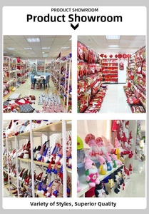 Showroom display featuring a wide variety of festive Christmas knitted socks and plush gnome ornaments