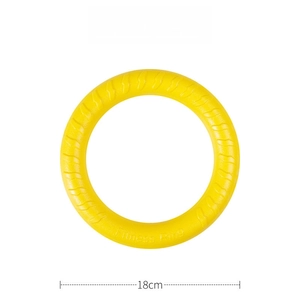 Detail of 18cm yellow dog fitness ring toy with anti-slip texture and embossed lettering