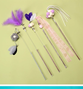 Detailed set of cat wand toys featuring purple feathers, pink ribbons and plush pom-poms