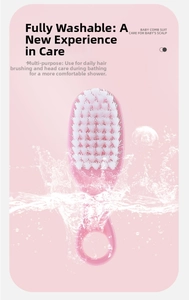 Close-up of pink baby hair brush with soft white bristles and waterproof design in water