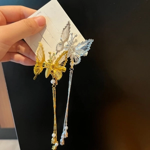 Golden and silver metal butterfly hair clips with elegant long bead tassels for women