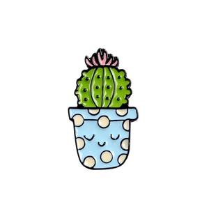 Cute green cactus enamel pin with pink flower and blue polka dot smiling face pot