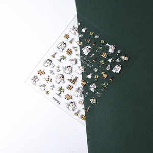 Macro detail of 5D embossed nail art stickers featuring Qatar Little Prince and camels