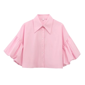 Pink cropped puff sleeve shirt featuring a pointed collar, displayed in a flat lay view
