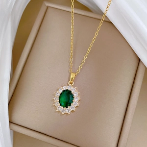 Elegant gold titanium steel necklace with oval green gemstone and diamond surround