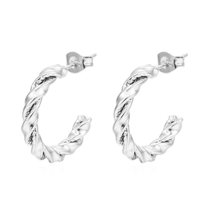 Close-up of silver-tone twisted rope texture hoop earrings with butterfly backings