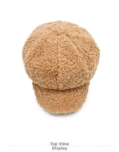 Vue de dessus d'une casquette gavroche camel chaude avec texture agneau bouclé