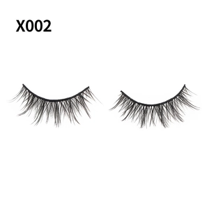 Detail of high density X002 false eyelashes with natural cross layered black fibers