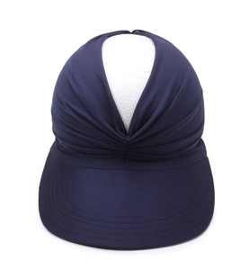 Detail view of navy blue pleated sun visor with breathable fabric on display