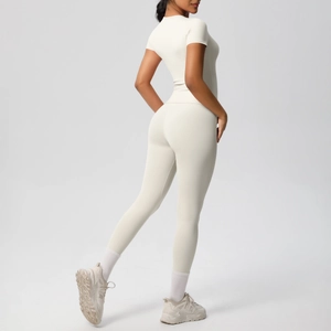 Detail of breathable brushed fabric on back of cream two-piece yoga set for women