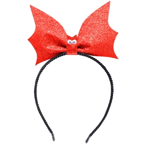 Detail shot of Halloween headband with sparkly red bat wings on a slim black frame