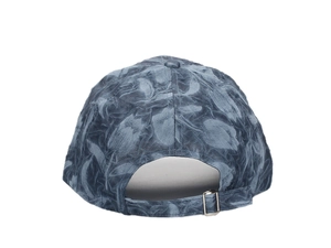 Detail of baseball cap back showing textured jacquard fabric and metal buckle adjustment