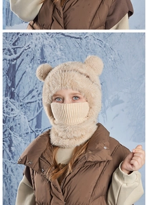 Close-up of beige plush bear hooded scarf with thick knit face mask and ear protection