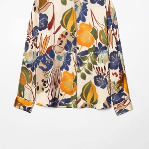 Women's silk-texture shirt with colorful artistic floral print and long sleeves