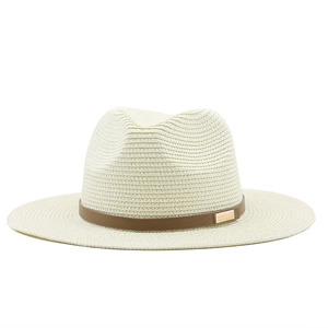 Detail of the woven texture and brown leather strap on the creamy straw fedora hat