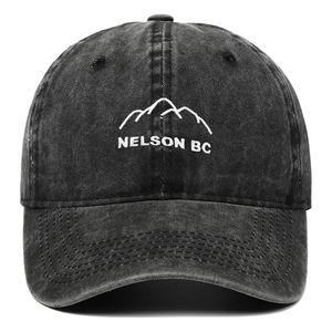 Faded charcoal baseball cap with mountain embroidery and white Nelson BC lettering