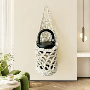 Handwoven cream cotton rope mesh bag for portable cups with an integrated hanging handle