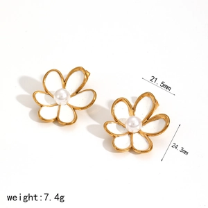Elegant white enamel flower earrings with gold edges and pearl center showing 24mm size