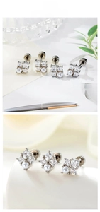 Macro shot of silver studs with square-cut zircon stones and white pearls in French style