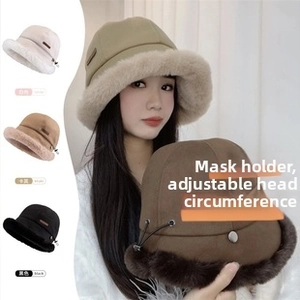 Detail view of winter bear ear bucket hat featuring mask hooks and adjustable drawstrings