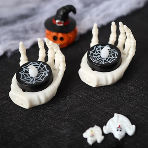 Halloween skeleton hand LED candle lamp with spider web base for festive table decoration