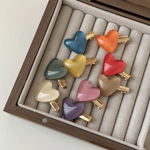 Set of 9 colorful jelly heart hair clips in a wooden display box for girls and women
