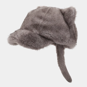Close-up of deep gray faux fur winter hat with cute cat ears and long earflaps