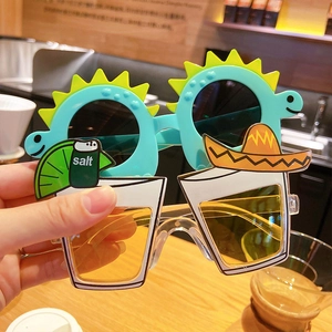 Funny dinosaur and cocktail party sunglasses with sombrero and salt shaker details