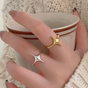 Minimalist 925 sterling silver four-point star ring in gold and silver finishes