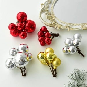 Christmas berry stems with matte, glossy, and disco ball textures in red, gold, and silver