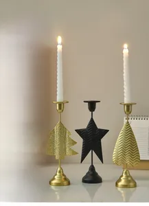 Detailed view of Nordic iron lanterns in heart, star, and Christmas tree shapes