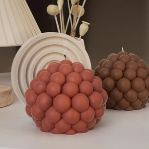 Artistic bubble sphere aromatherapy candle in brick red and dark brown matte finish