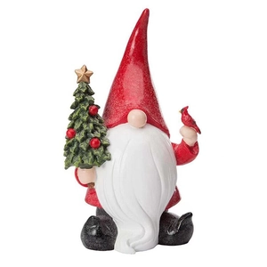 Christmas resin gnome figurine with red hat and small green tree on white background