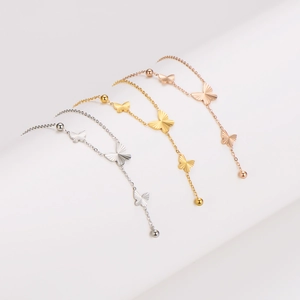 Minimalist butterfly tassel necklaces in silver, gold, and rose gold stainless steel
