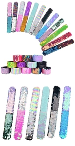 Macro shot of colorful mermaid sequin slap bracelets showing reversible double-sided effects