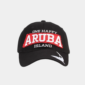 Detail of embroidered Aruba patch and marlin fish silhouette on black cotton golf cap