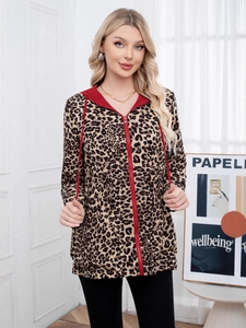 Women's leopard print hooded jacket with red zipper trim and black waist drawstring