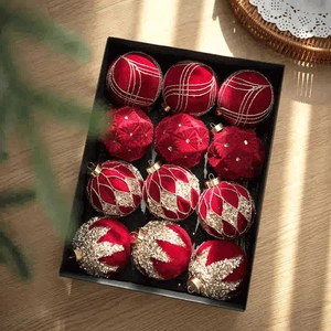 12-piece set of red velvet Christmas balls with gold glitter patterns in a gift box