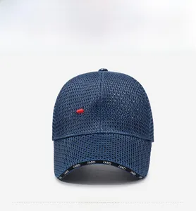 Detail of blue mesh baseball cap featuring FARD white embroidery and breathable fabric