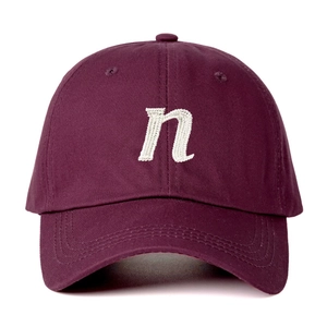 Classic burgundy cotton baseball cap with white embroidered letter N on white background